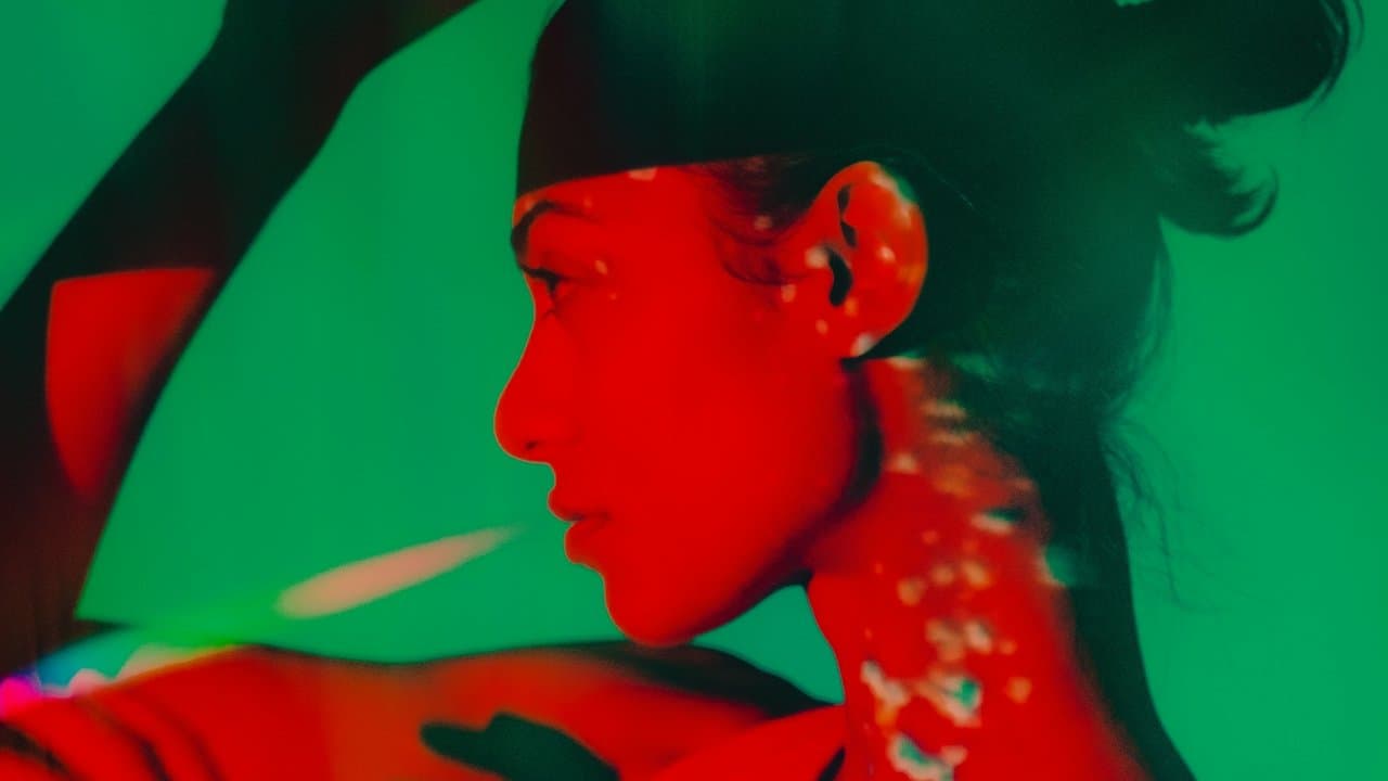 Woman in editorial green and red light — VitalYOU medical team